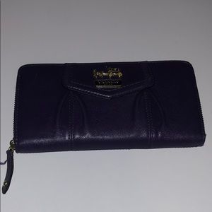 Plum coach wallet